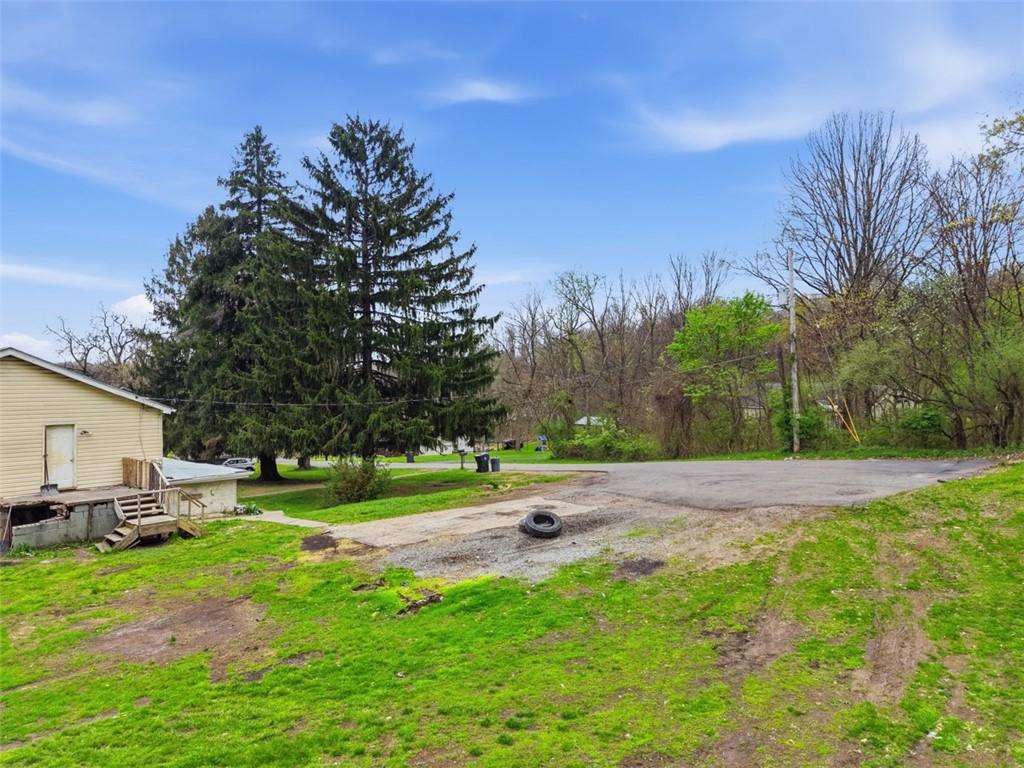 96 Meanor Street Imperial, PA 15126 - Photo 8 of 44 a view of backyard of house with green space