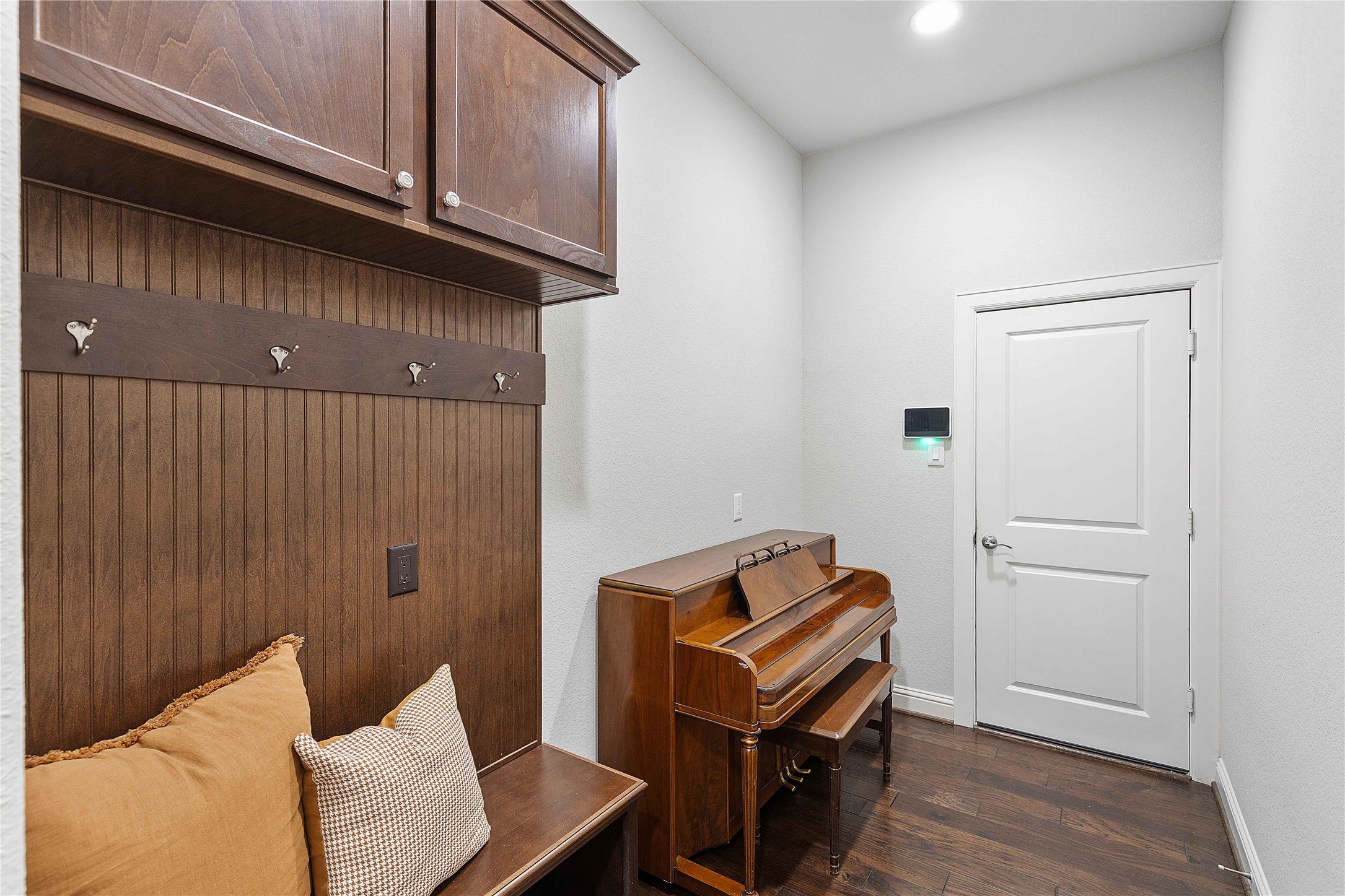29539 Monona Terrace Court Spring, TX 77386 - Photo 12 of 50 Throw your bags and shoes down after a long day in the mud room, right off the garage! *Staged furniture and accessories do not convey with the home*