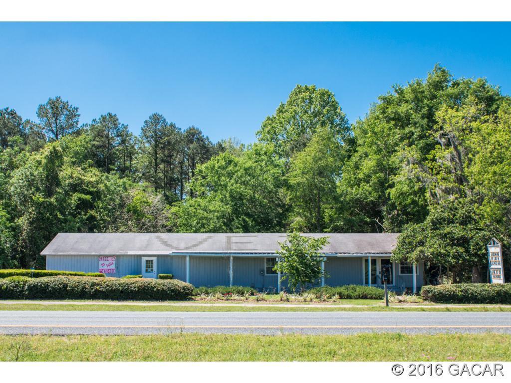 22211 West Newberry Road Newberry, FL 32669 - Photo 1 of 1 a view of house with outdoor space and seating area