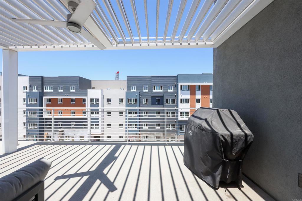 2040 Bravo Loop, Unit 5 Chula Vista, CA 91915 - Photo 13 of 58 a view of balcony with wooden floor