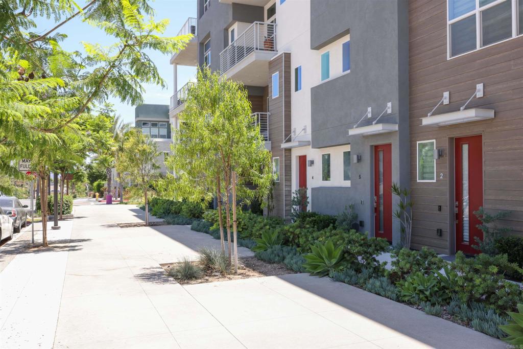 2040 Bravo Loop, Unit 5 Chula Vista, CA 91915 - Photo 47 of 58 a view of a pathway both side of house