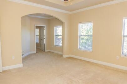 509 Pheasant Trail Crestview, FL 32536 - Photo 21 of 29 an empty room with windows