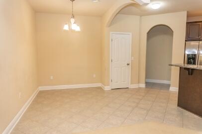 509 Pheasant Trail Crestview, FL 32536 - Photo 6 of 29 a view of an empty room with a window
