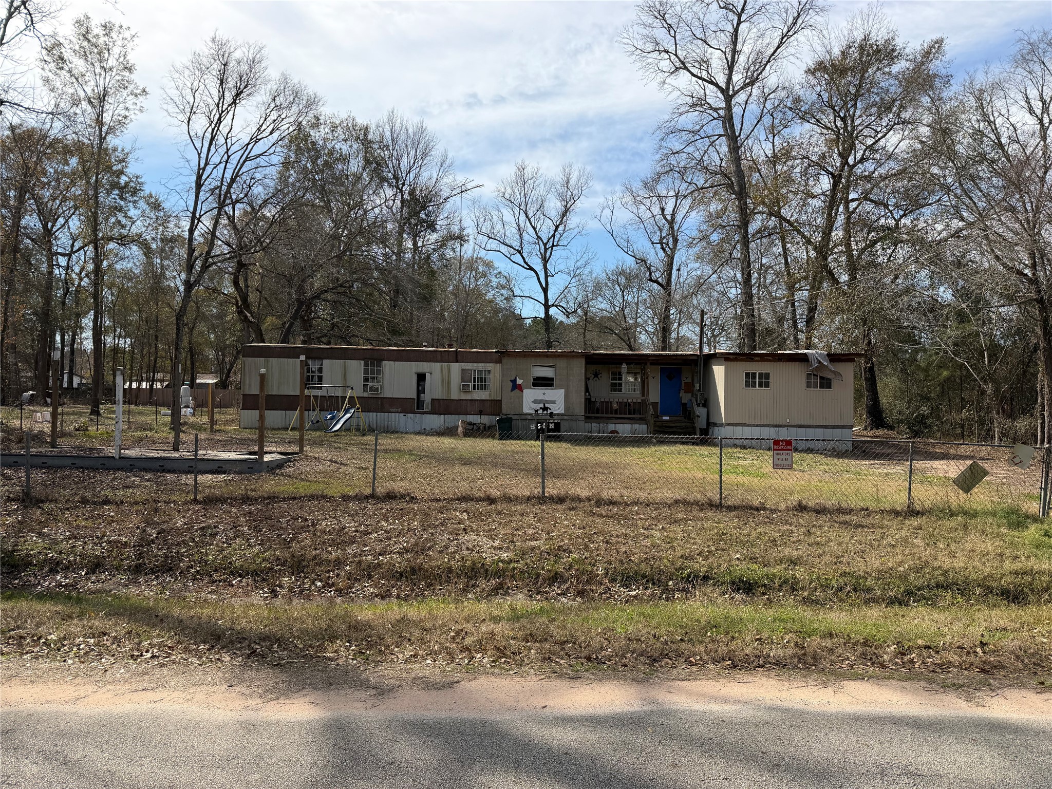 10908 L And M Road Montgomery, TX 77316 - Photo 3 of 5 a backyard of a house with lots of green space