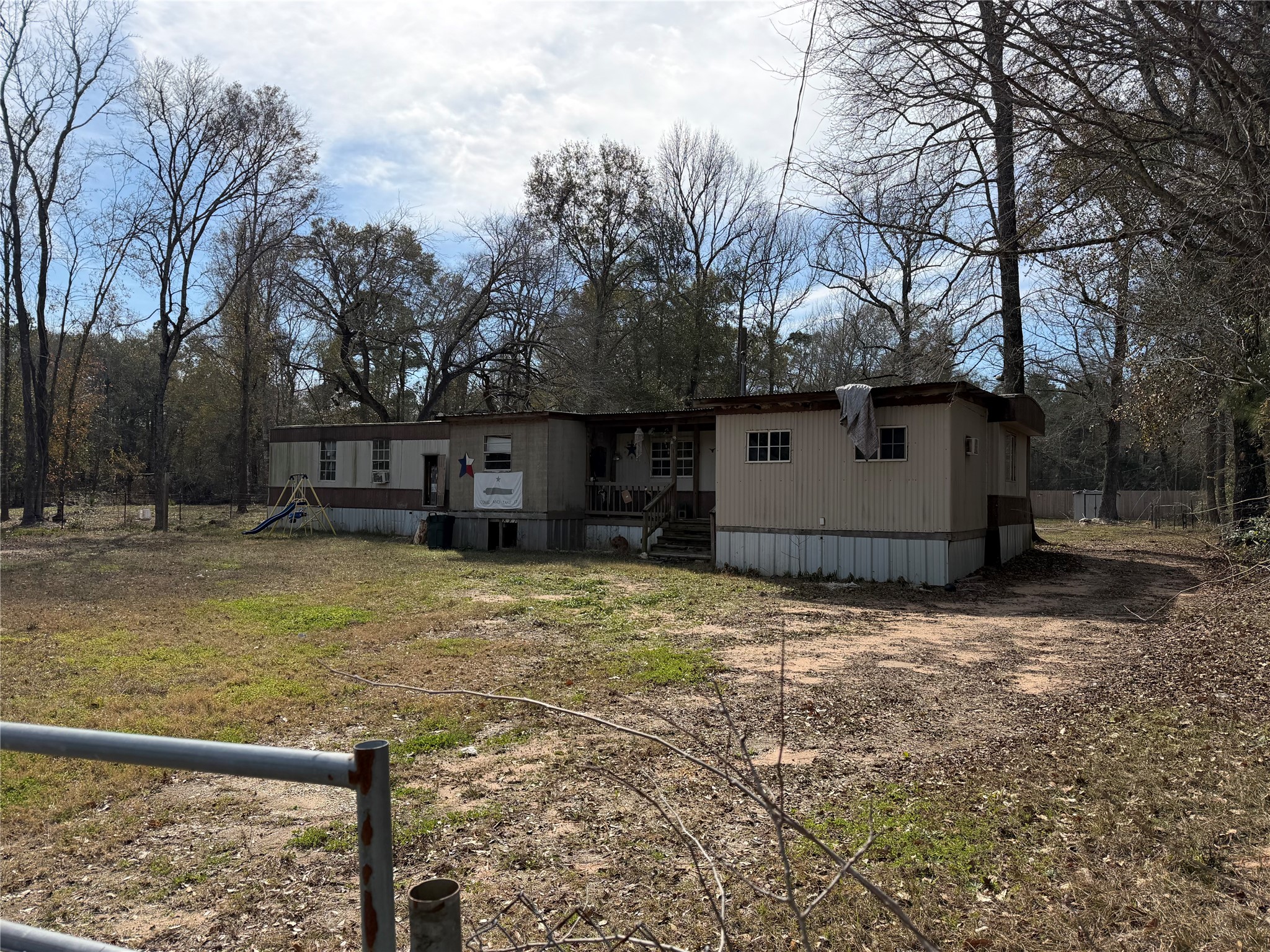 10908 L And M Road Montgomery, TX 77316 - Photo 4 of 5 a house view with a swimming pool