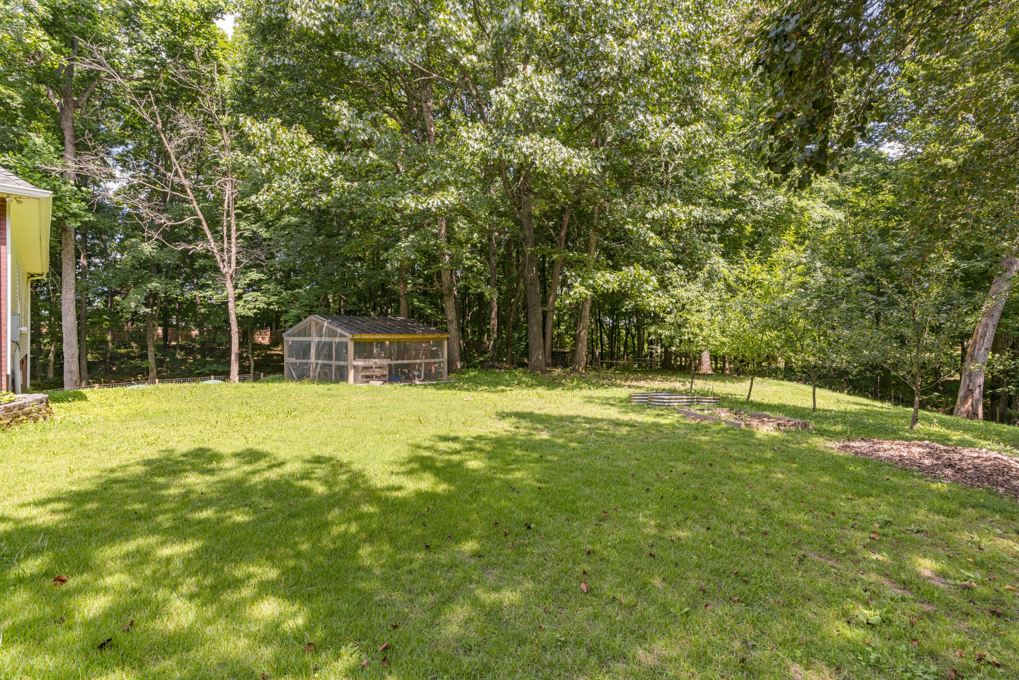 7339 Chowning Road Springfield, TN 37172 - Photo 4 of 57 a swimming pool with outdoor seating and yard