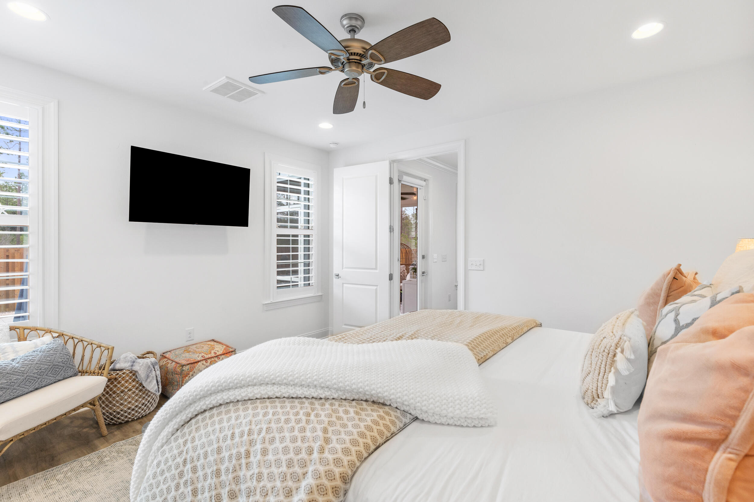 229 Windrow Way Inlet Beach Inlet Beach, FL 32461 - Photo 14 of 43 a bedroom with a large bed and a flat screen tv