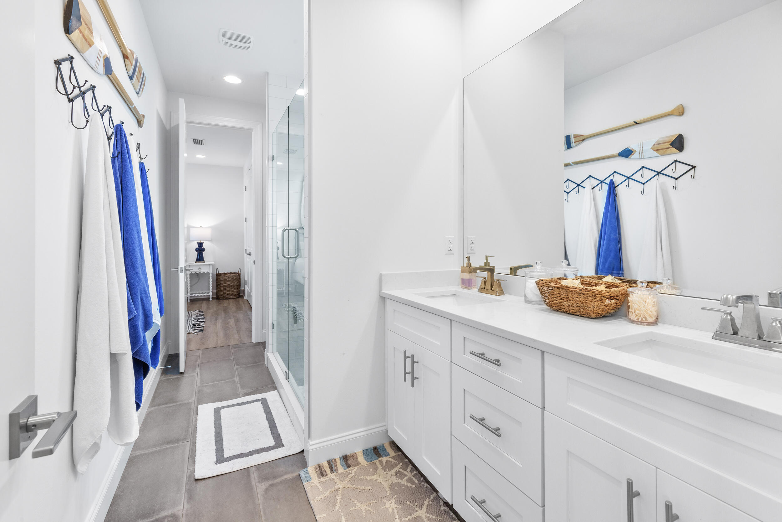 229 Windrow Way Inlet Beach Inlet Beach, FL 32461 - Photo 21 of 43 a bathroom with a double vanity sink and a mirror