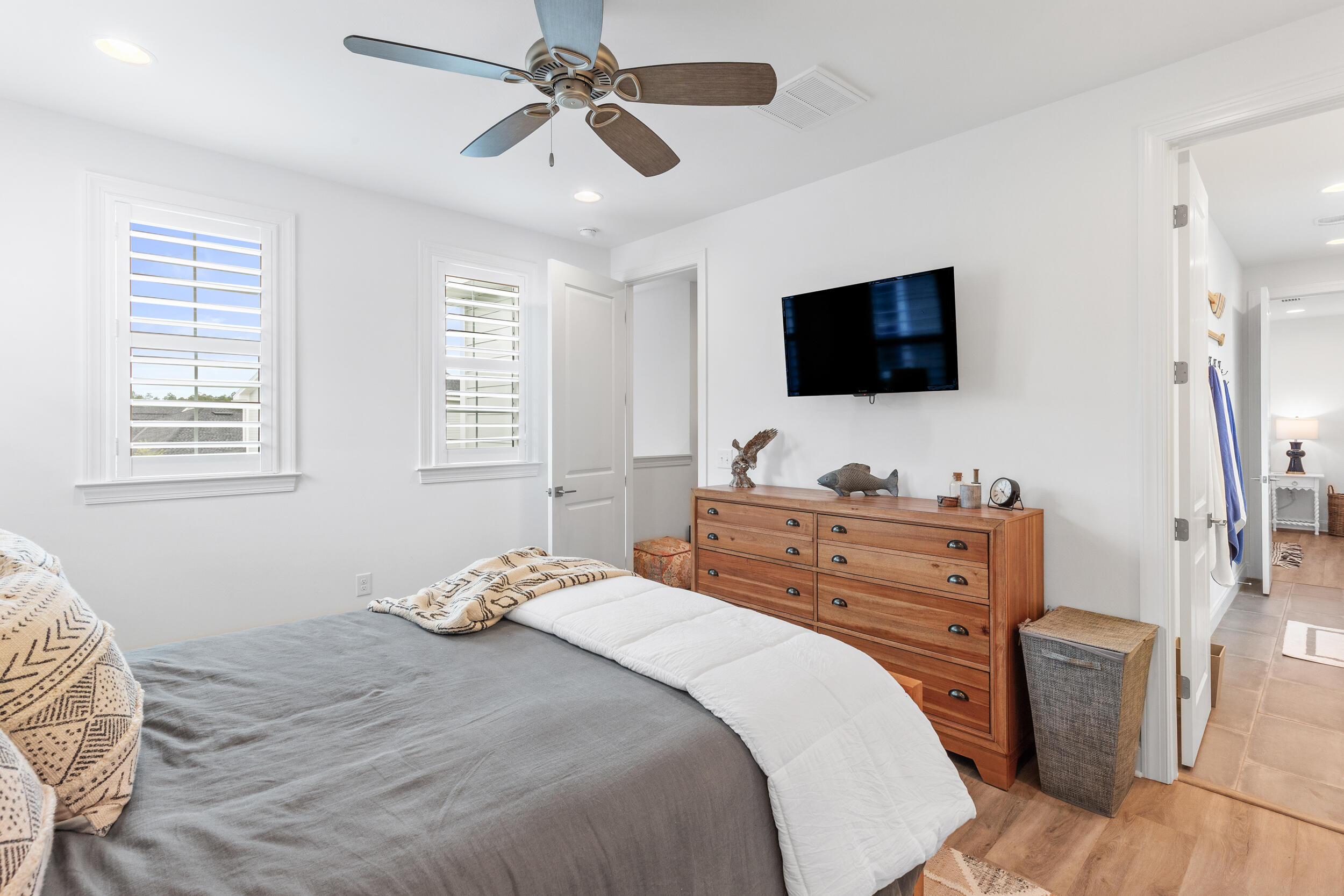 229 Windrow Way Inlet Beach Inlet Beach, FL 32461 - Photo 23 of 43 a bedroom with a bed and a flat screen tv