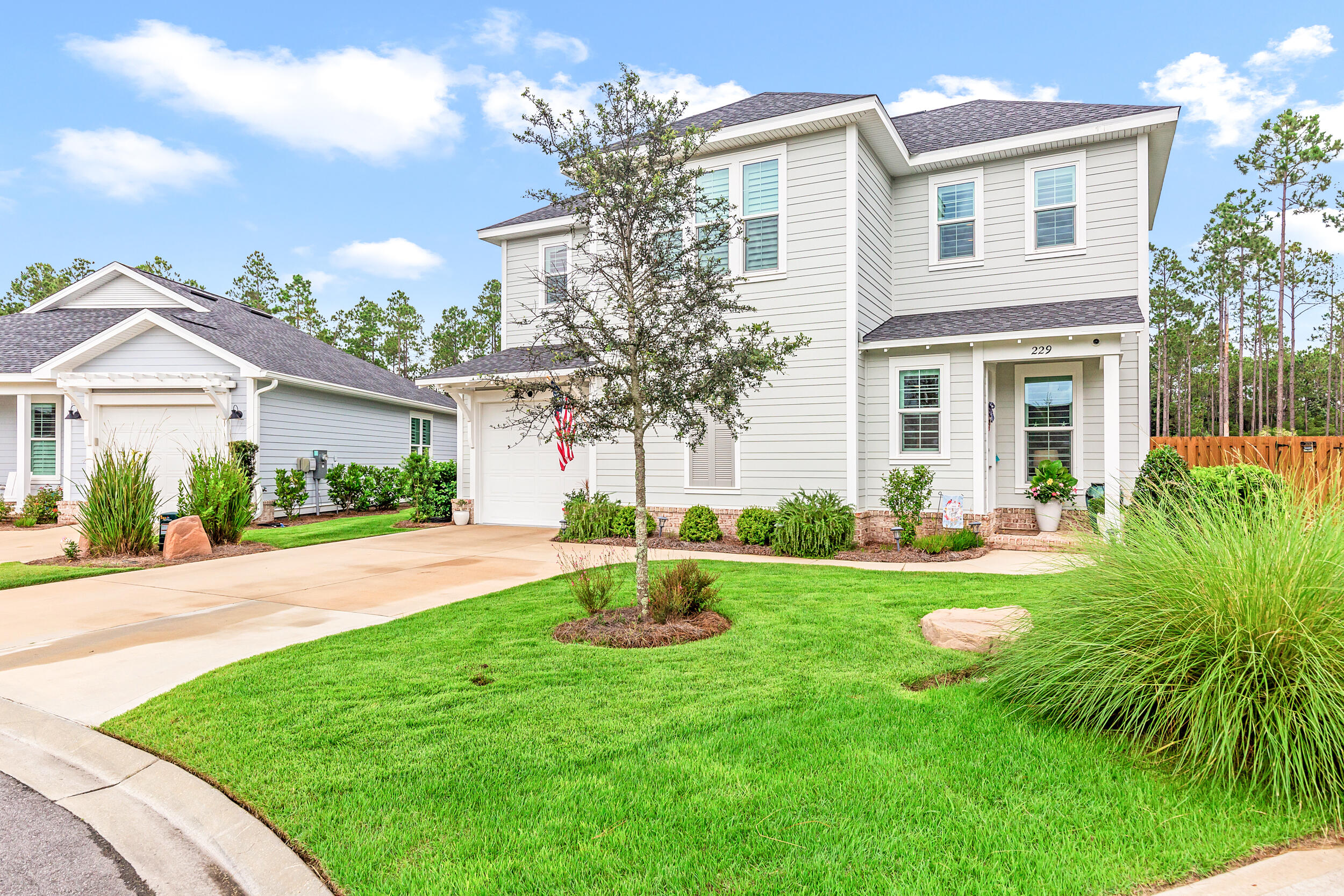 229 Windrow Way Inlet Beach Inlet Beach, FL 32461 - Photo 40 of 43 a house with garden in front of it