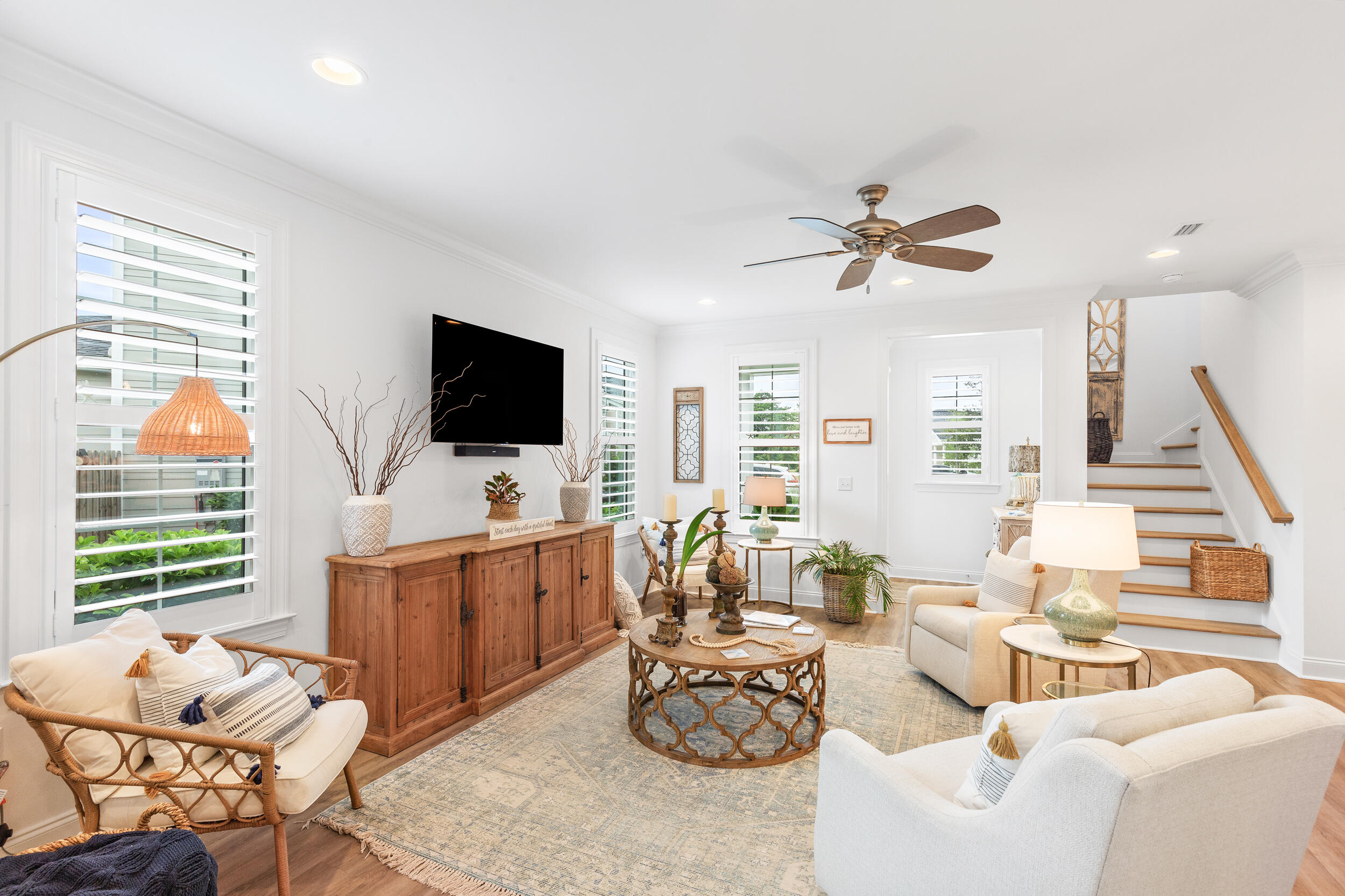 229 Windrow Way Inlet Beach Inlet Beach, FL 32461 - Photo 5 of 43 a living room with furniture a flat screen tv and a large window
