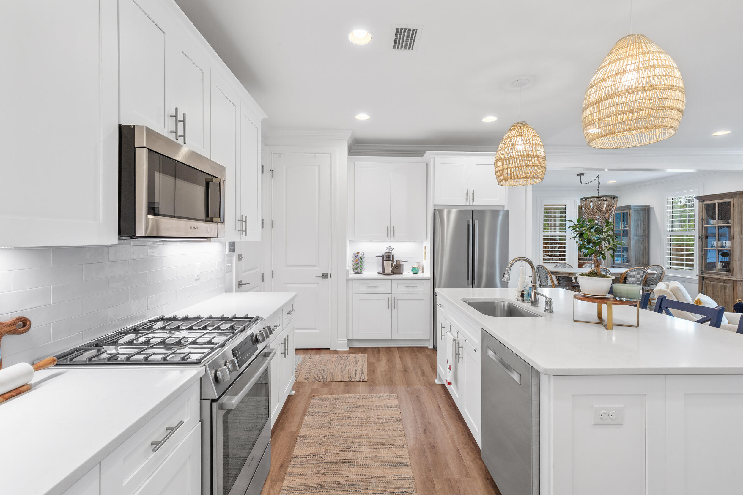 229 Windrow Way Inlet Beach Inlet Beach, FL 32461 - Photo 8 of 43 a kitchen with a sink stove and cabinets