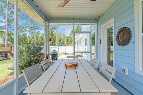a view of a patio with a yard