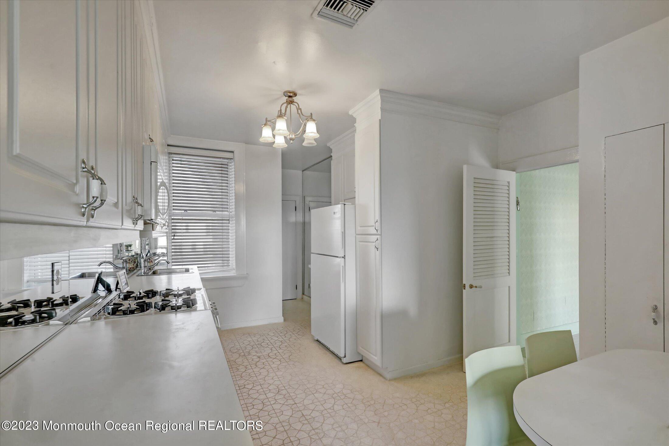 1 Roseld Avenue, Unit A3 Deal, NJ 07723 - Photo 14 of 35 a very nice looking room with a large window