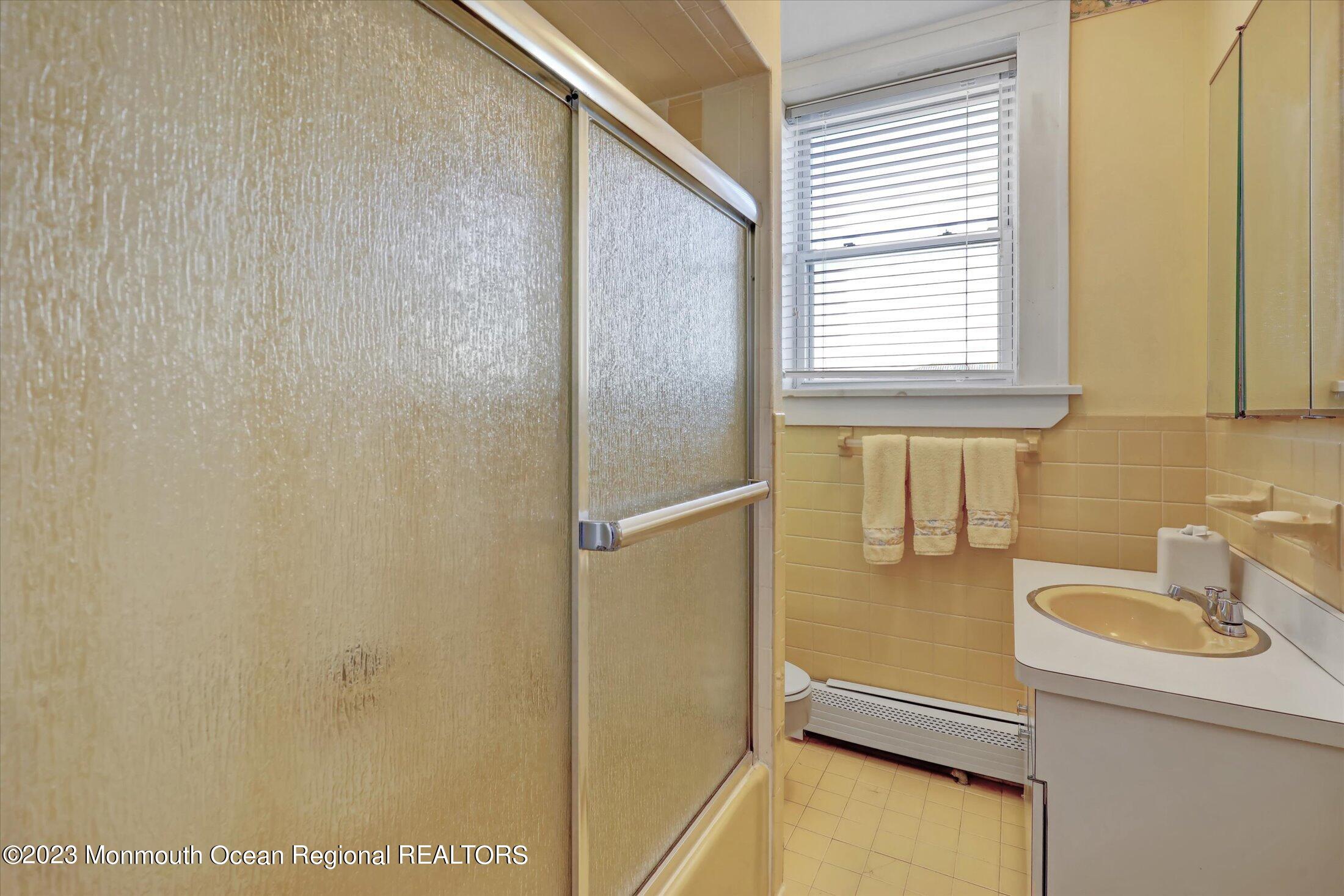 1 Roseld Avenue, Unit A3 Deal, NJ 07723 - Photo 26 of 35 a bathroom with a sink and a shower