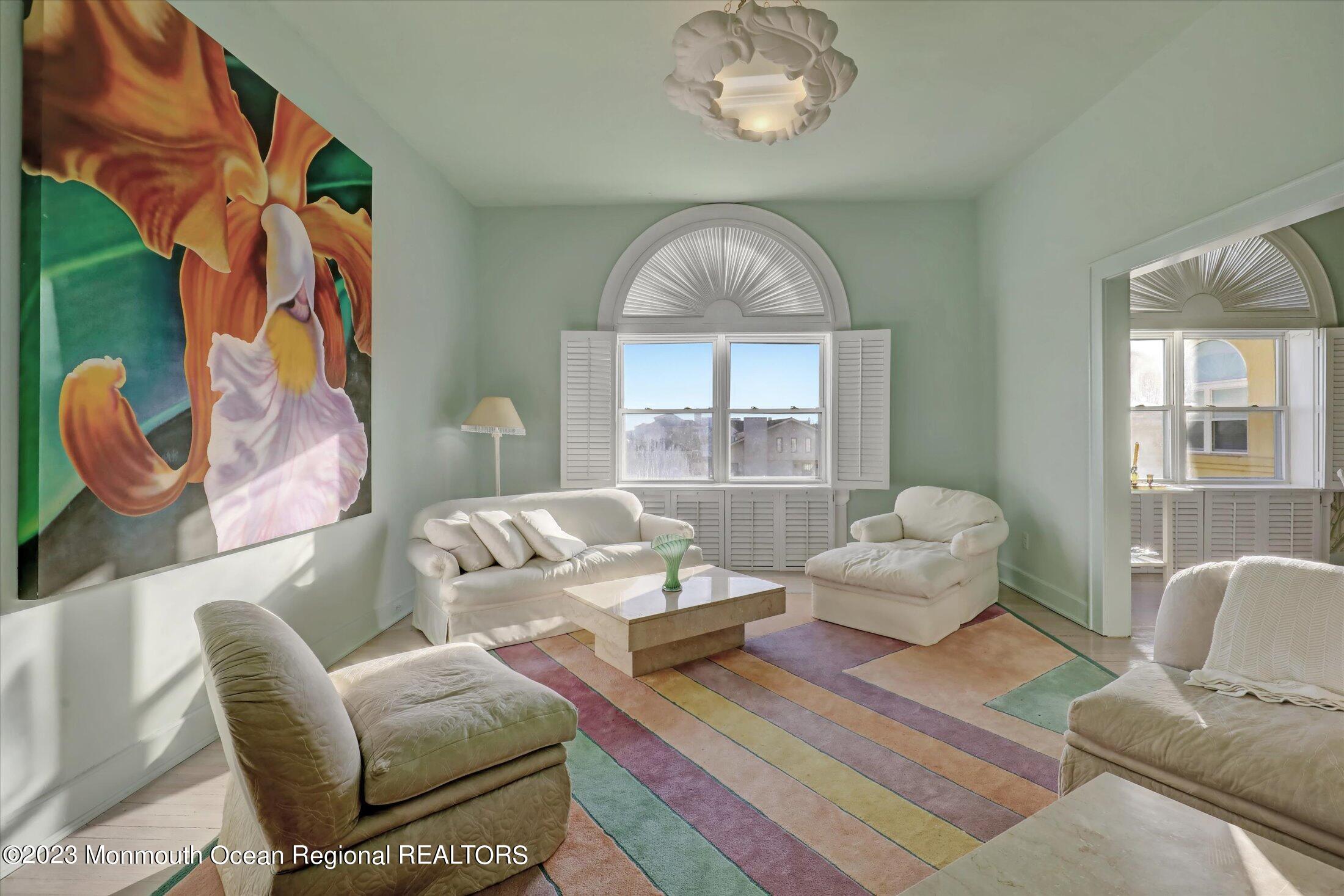 1 Roseld Avenue, Unit A3 Deal, NJ 07723 - Photo 5 of 35 a living room with furniture and a large window