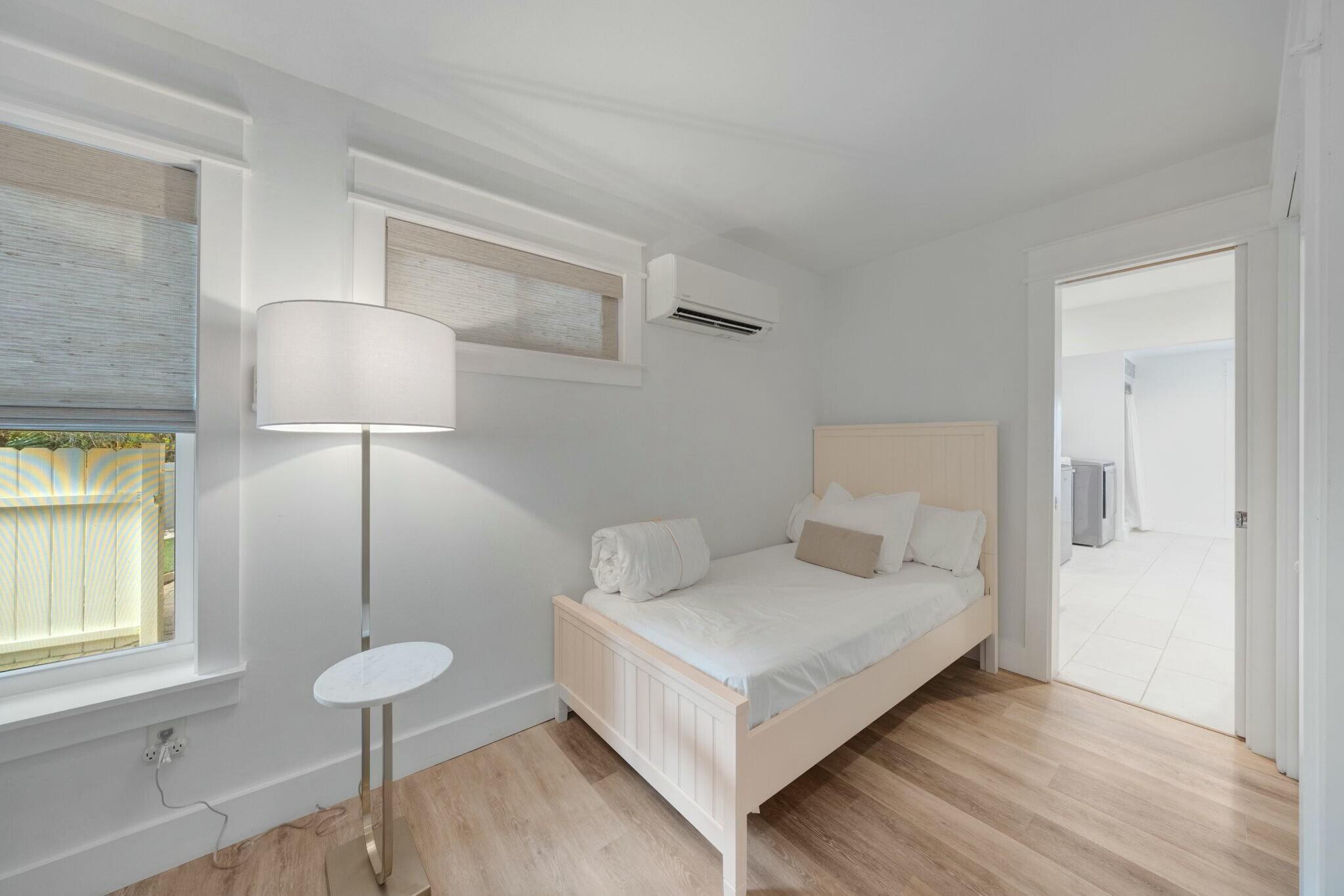 239 Pelican Circle Inlet Beach, FL 32461 - Photo 24 of 80 a bedroom with a bed and a lamp