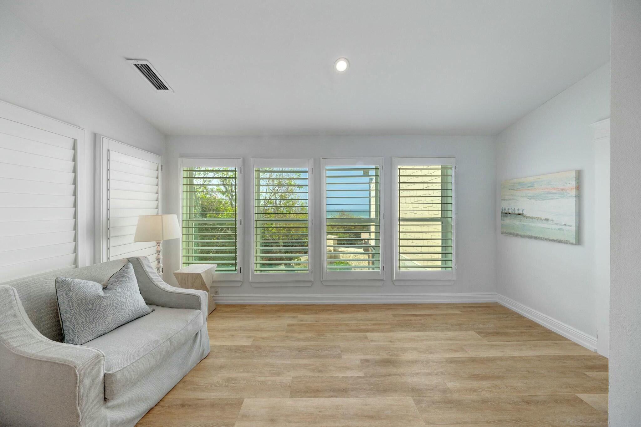 239 Pelican Circle Inlet Beach, FL 32461 - Photo 33 of 80 a living room with furniture and large windows