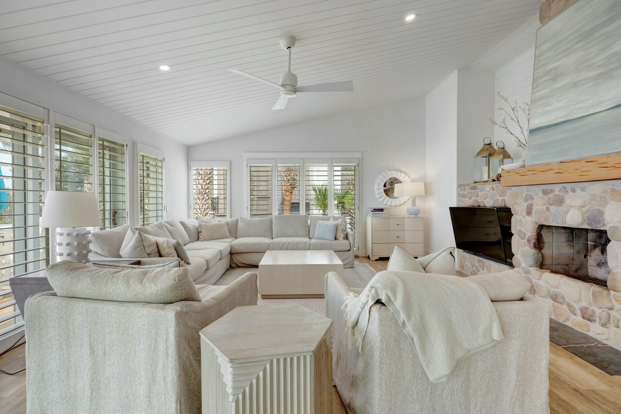 239 Pelican Circle Inlet Beach, FL 32461 - Photo 54 of 80 a living room with fireplace furniture and a large window