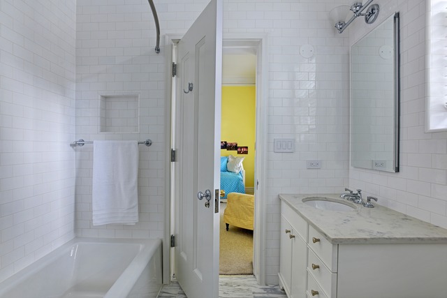 6 East Scott Street, Unit 6 Chicago, IL 60610 - Photo 14 of 25 a bathroom with a granite countertop sink and a mirror