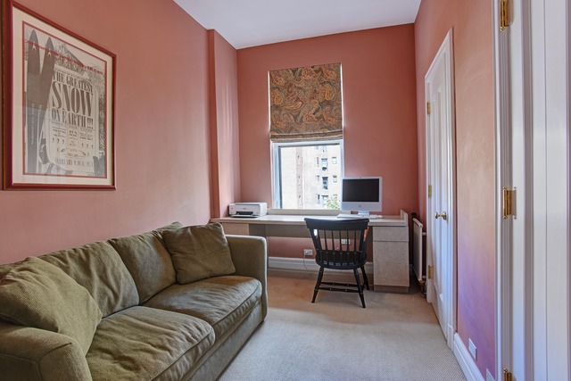 6 East Scott Street, Unit 6 Chicago, IL 60610 - Photo 16 of 25 a living room with furniture and a window