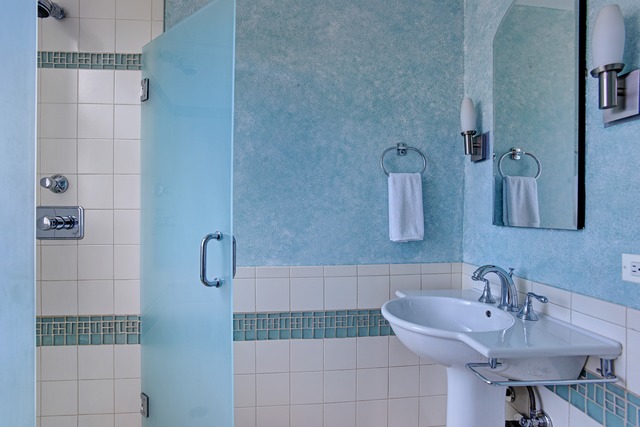 6 East Scott Street, Unit 6 Chicago, IL 60610 - Photo 17 of 25 a bathroom with a sink and a mirror