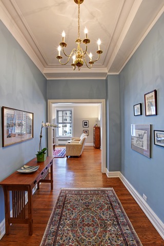 6 East Scott Street, Unit 6 Chicago, IL 60610 - Photo 2 of 25 a living room with furniture and a chandelier