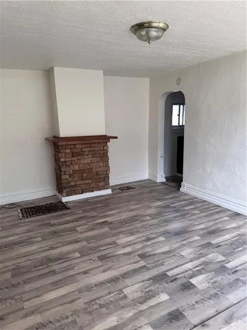 a bathroom with a toilet a sink and bathtub