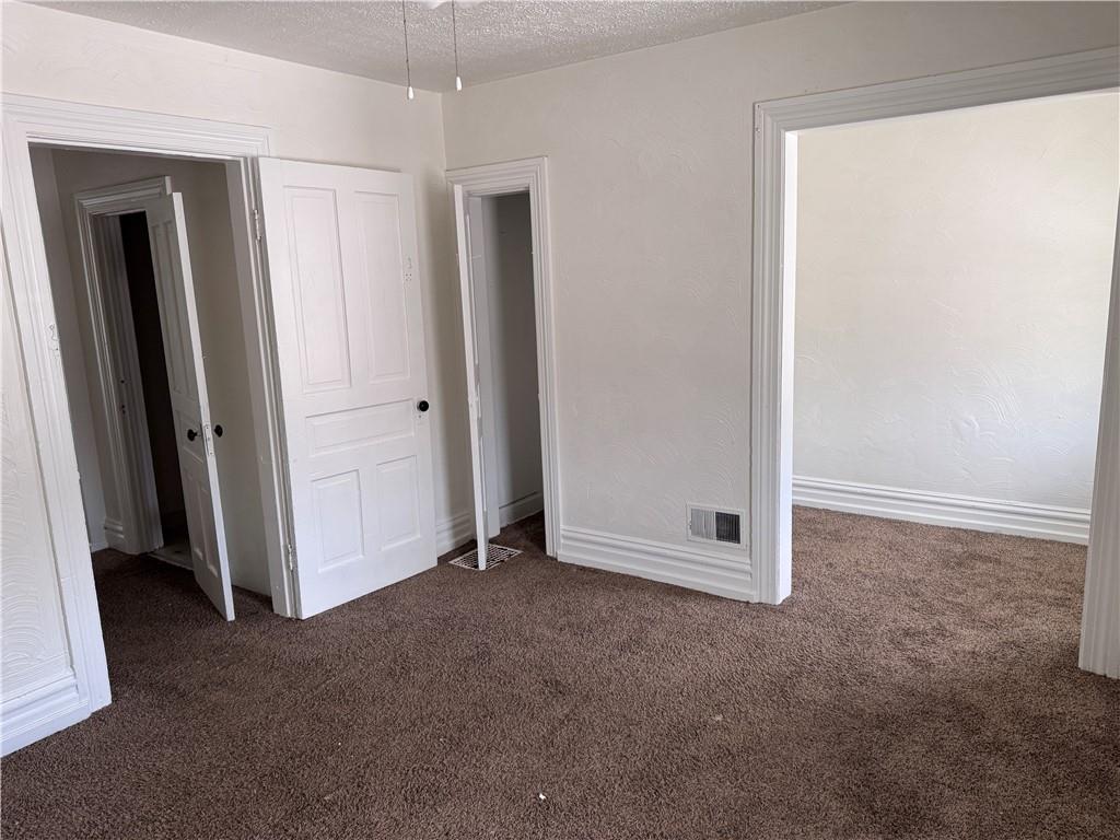 137 Sherman Avenue Vandergrift, PA 15690 - Photo 19 of 31 an empty room with windows