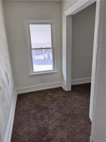an empty room with closet