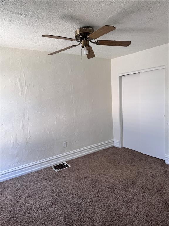 137 Sherman Avenue Vandergrift, PA 15690 - Photo 23 of 31 a view of a room with closet and chandelier fan