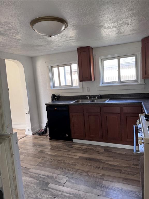 137 Sherman Avenue Vandergrift, PA 15690 - Photo 5 of 31 a kitchen with a sink and wooden cabinets