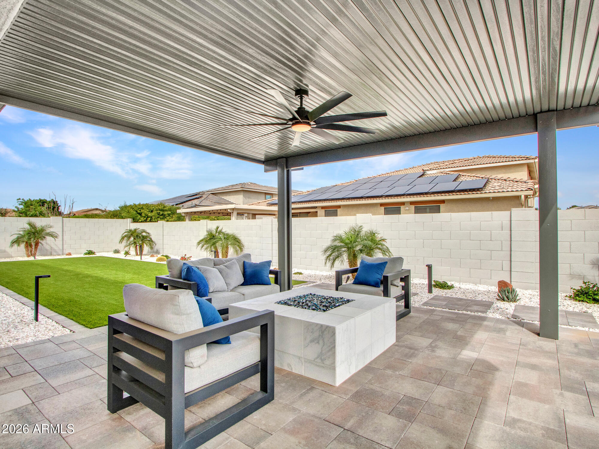14350 West Boca Raton Road Surprise, AZ 85379 - Photo 52 of 75 Custom Stone Cut Fire-Pit