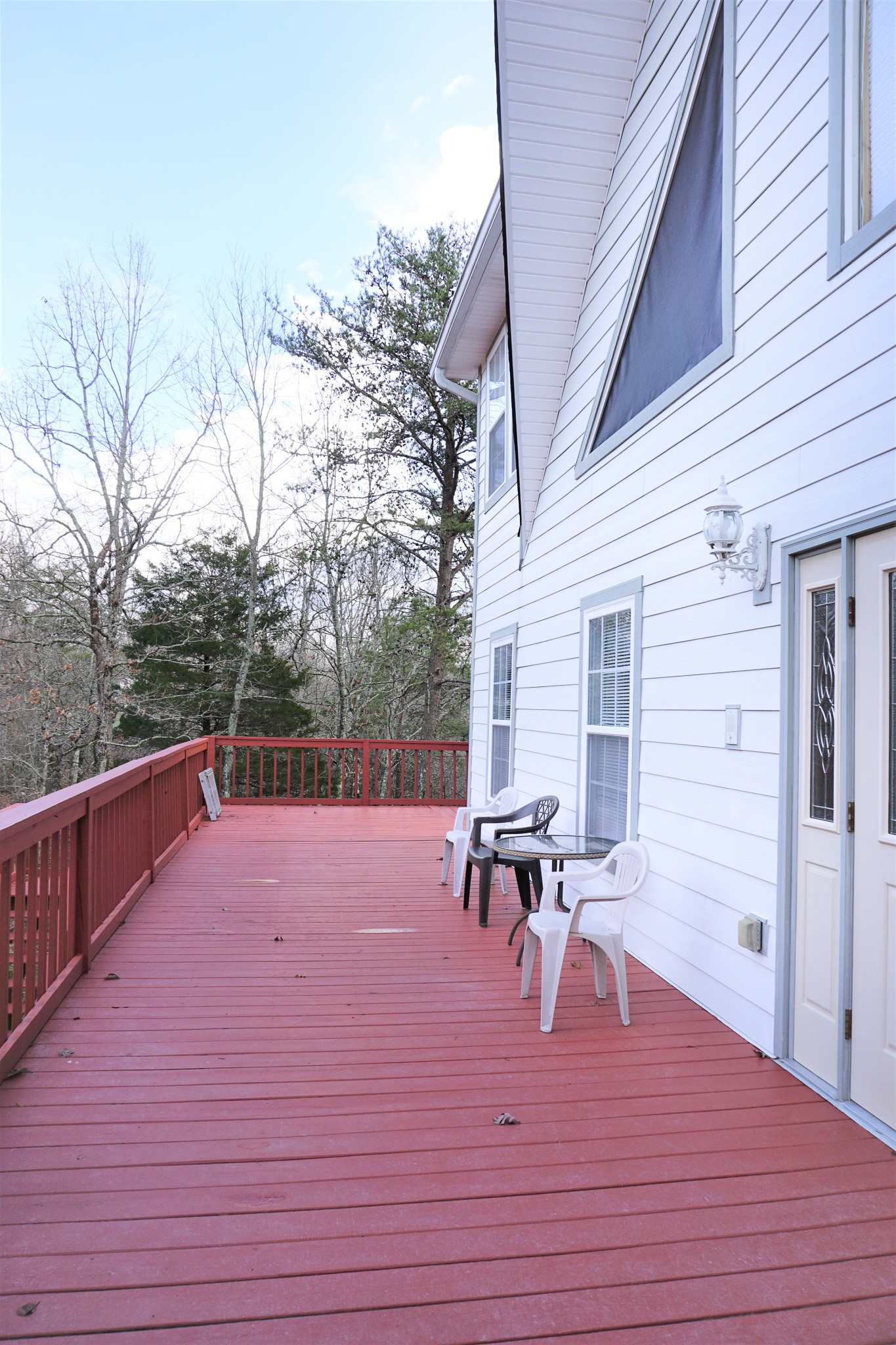 488 Meyers Road Altamont, TN 37301 - Photo 3 of 32 a view of a patio with table and chairs with wooden floor and fence