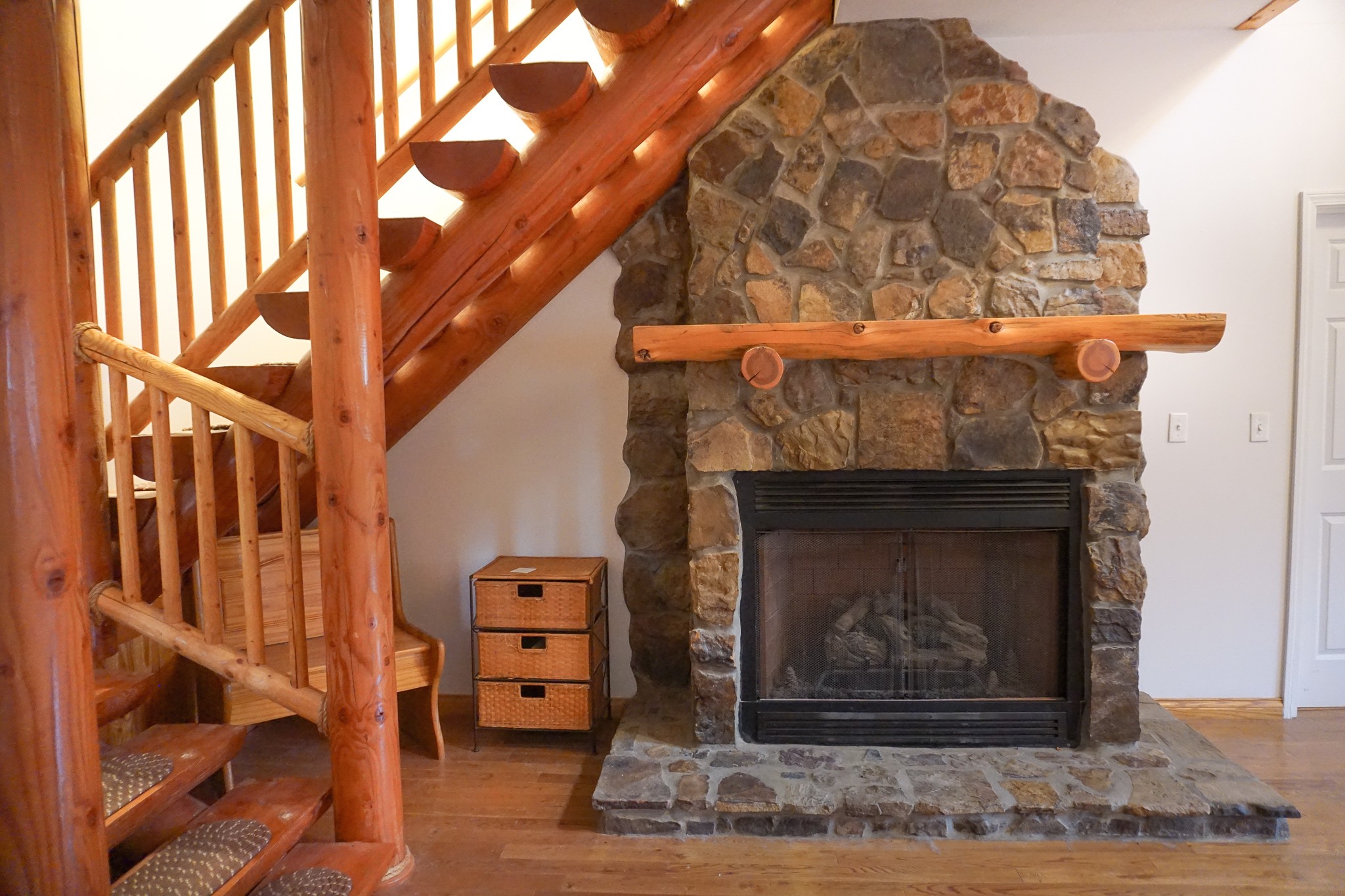 488 Meyers Road Altamont, TN 37301 - Photo 4 of 32 a living room with furniture a fireplace and a flat screen tv
