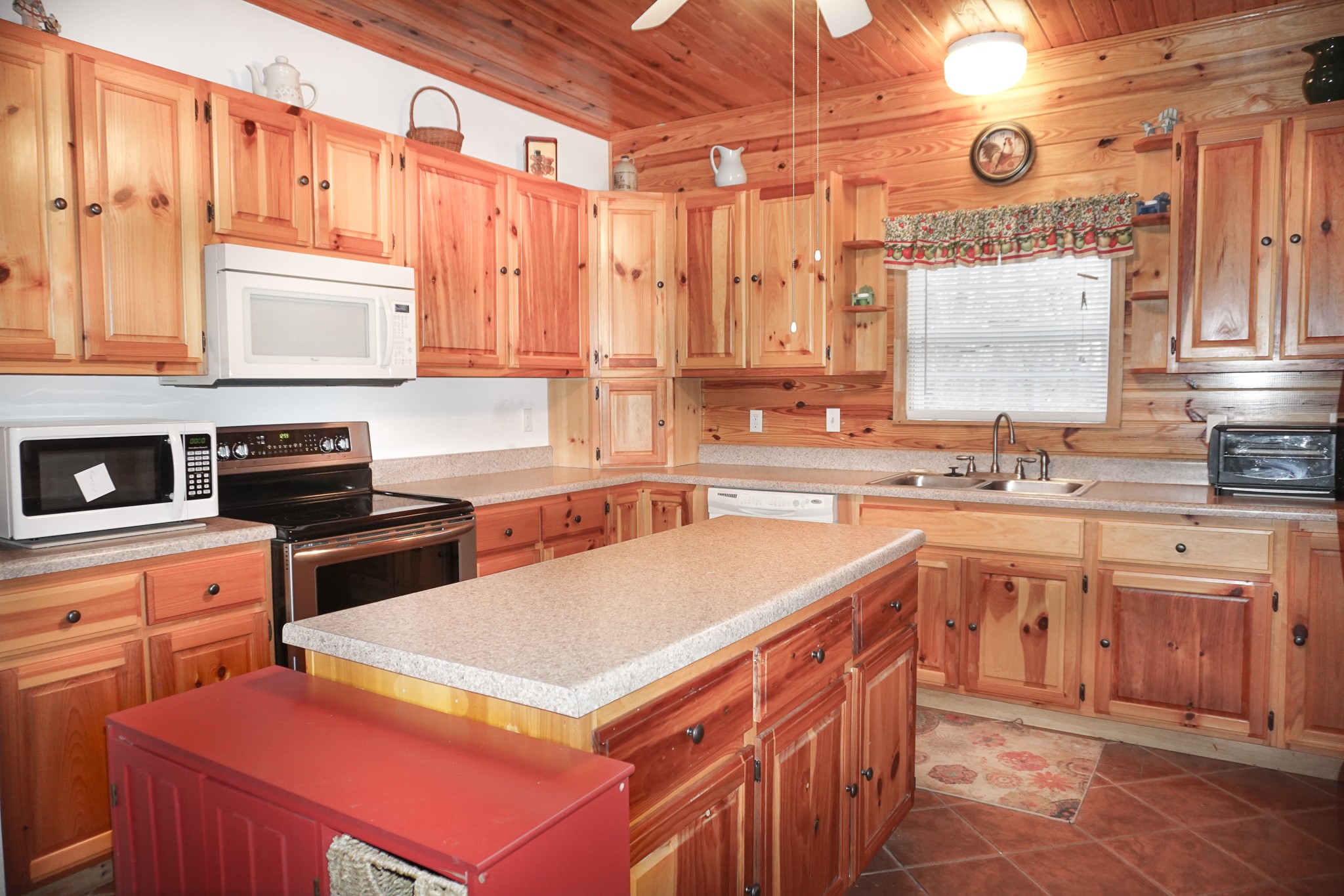 488 Meyers Road Altamont, TN 37301 - Photo 8 of 32 a kitchen with stainless steel appliances a stove sink and cabinets