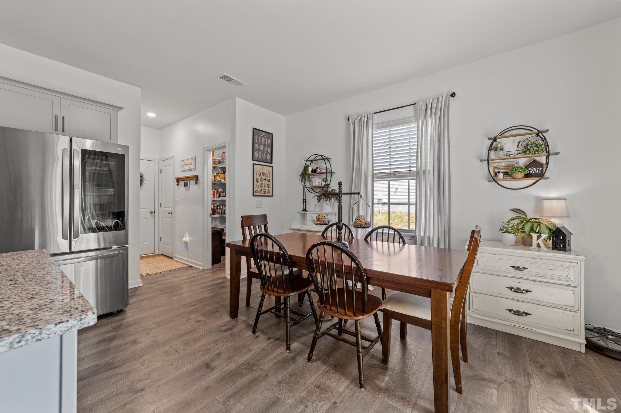 3116 Longpine Road Burlington, NC 27215 - Photo 13 of 29 a view of a dining room with furniture