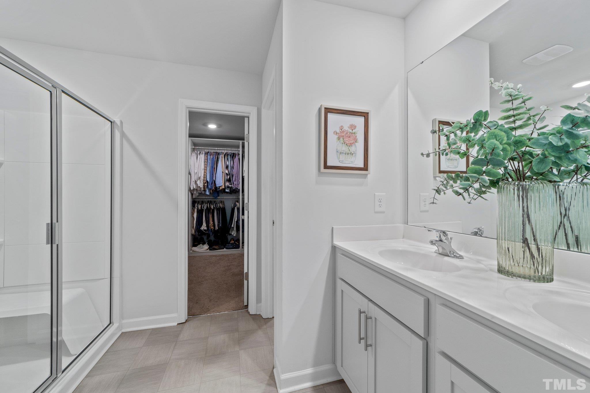 3116 Longpine Road Burlington, NC 27215 - Photo 18 of 29 a bathroom with a sink and mirror
