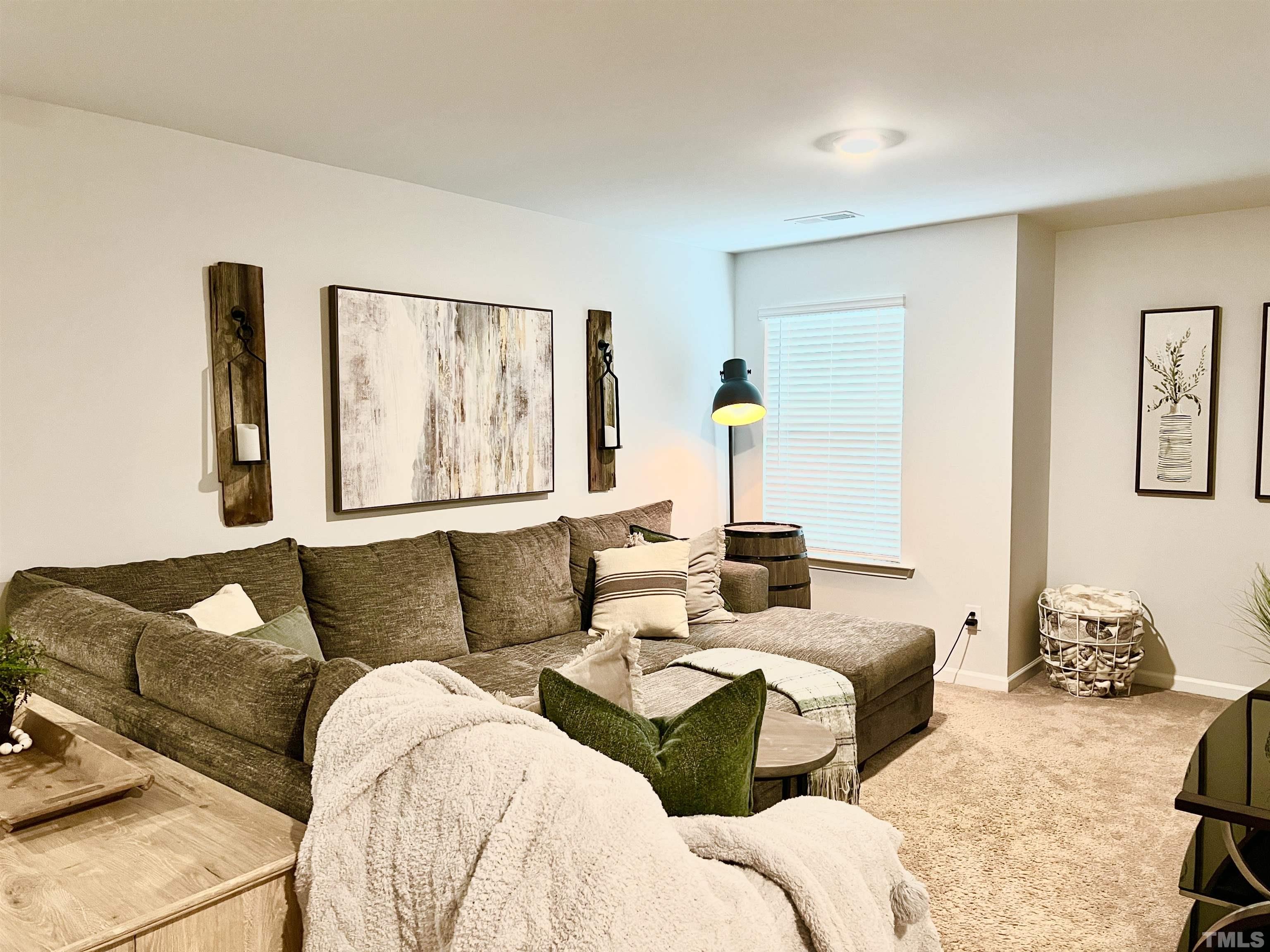 3116 Longpine Road Burlington, NC 27215 - Photo 19 of 29 a living room with furniture and a window