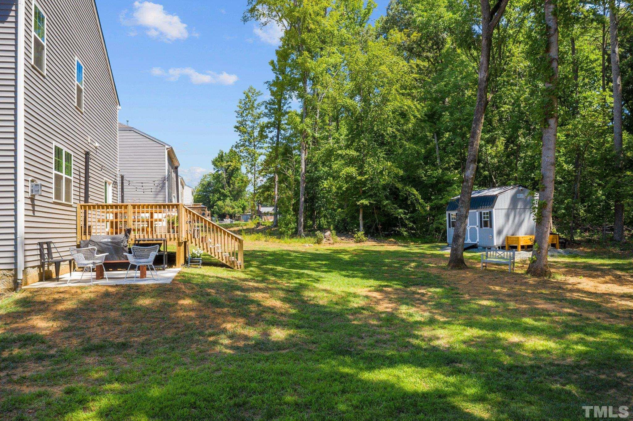 3116 Longpine Road Burlington, NC 27215 - Photo 4 of 29 a view of a house with backyard and sitting area
