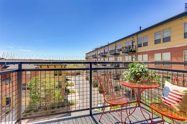 a kitchen with stainless steel appliances a refrigerator stove microwave and sink