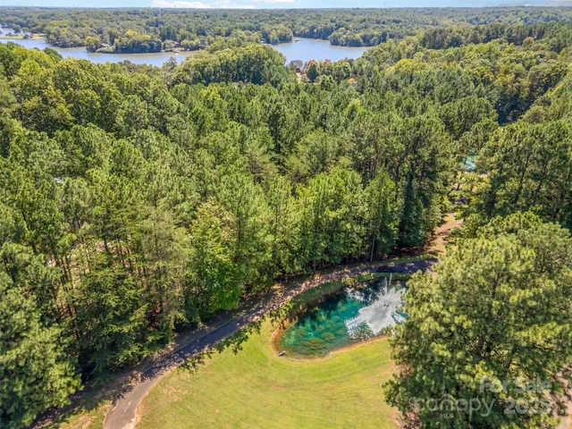 a view of a lake with a house