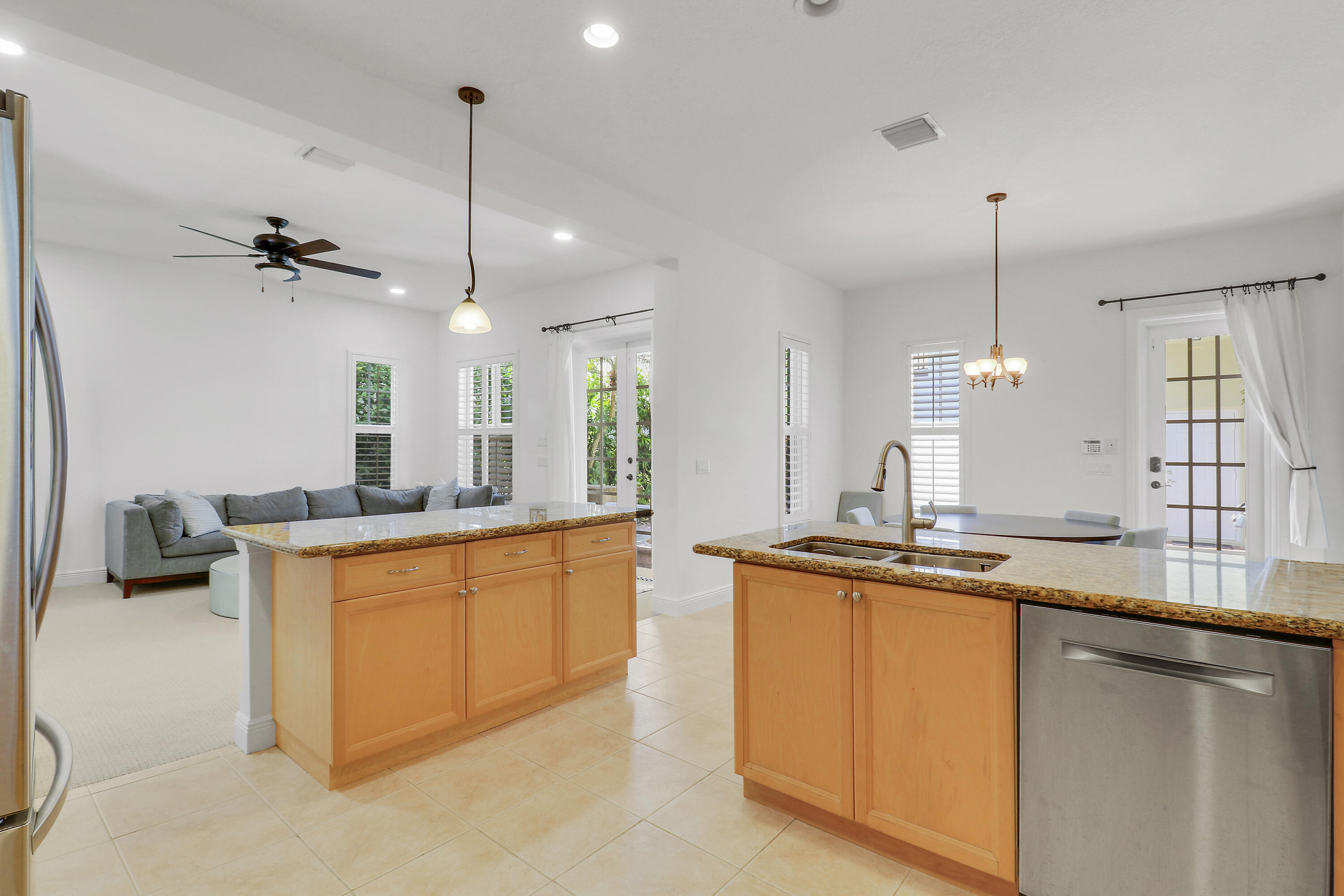 108 Spikerush Road Jupiter, FL 33458 - Photo 6 of 37 Kitchen and Great Room