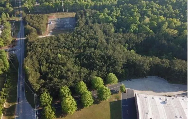 a aerial view of a house with a yard