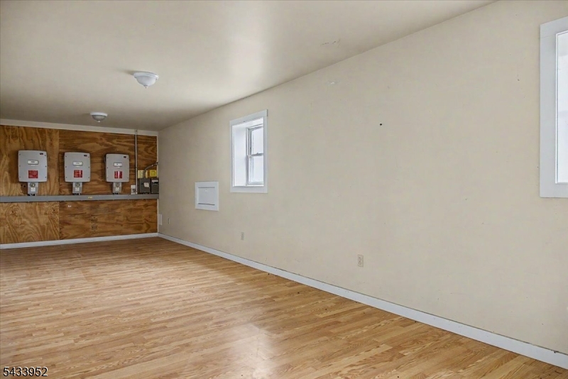 80 Valley Crest Road Annandale, NJ 08801 - Photo 24 of 42 wooden floor in an empty room with a window
