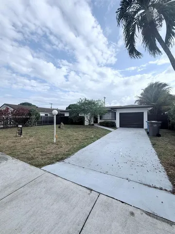 front view of house with a yard