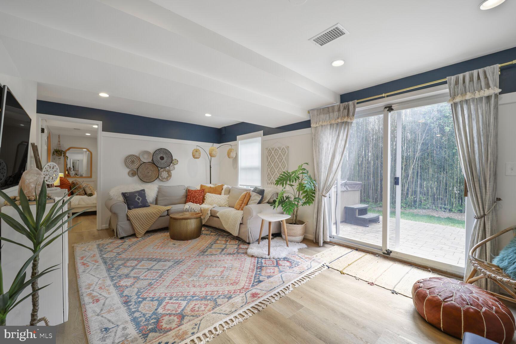 3012 Marlow Road Silver Spring, MD 20904 - Photo 22 of 49 a living room with furniture and a potted plant