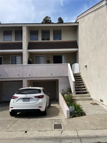 a car parked in front of a building