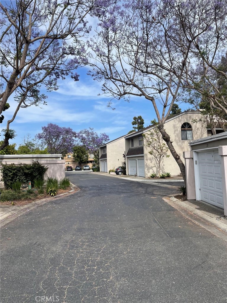 404 Brighton Springs Costa Mesa, CA 92627 - Photo 21 of 22 front view of a house with a street