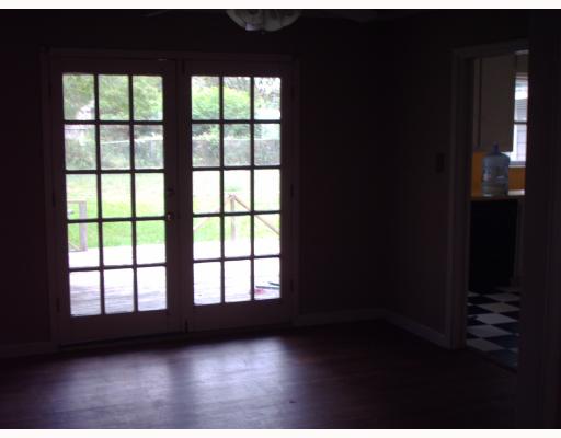 1813 Encino Avenue Alice, TX 78332 - Photo 2 of 4 a view of an empty room with a window